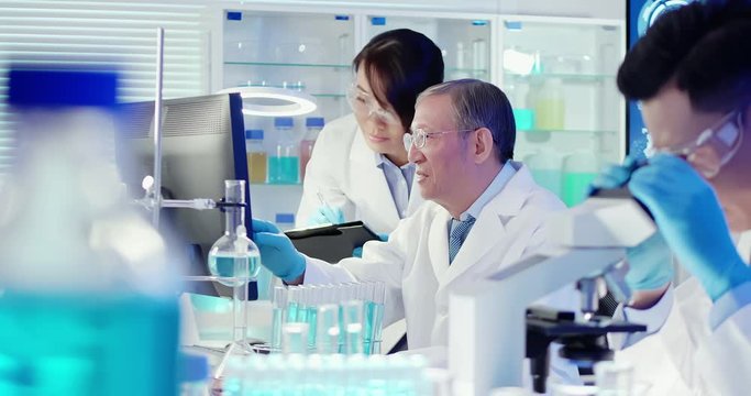 asian scientist team meeting