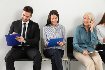 People waiting for job interview in office