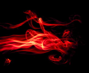 Red smoke on black background