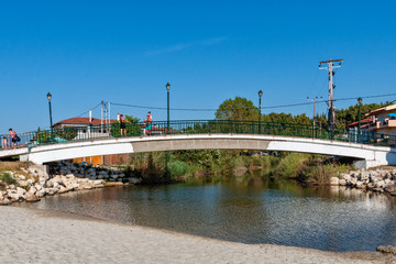 Halkidiki, Greece - August 30,2019: Siviri golden Beach and beach tourists. The place of Siviri in Halkidiki, Greece. Blue sea on Aegean sea.