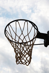 basketball hoop on background of blue sky