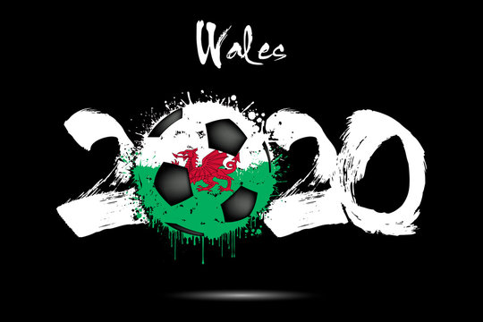 2020 and soccer ball in color of Wales flag