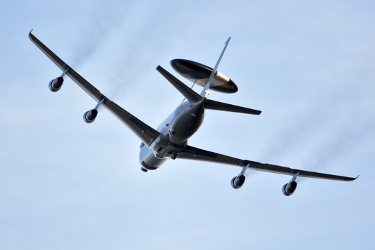 SANICOLE, BELGIUM - SEP 13, 2019: NATO Boeing E-3 Sentry AWACS radar plane performing a low-pass at the Sanice Sunset Airshow.