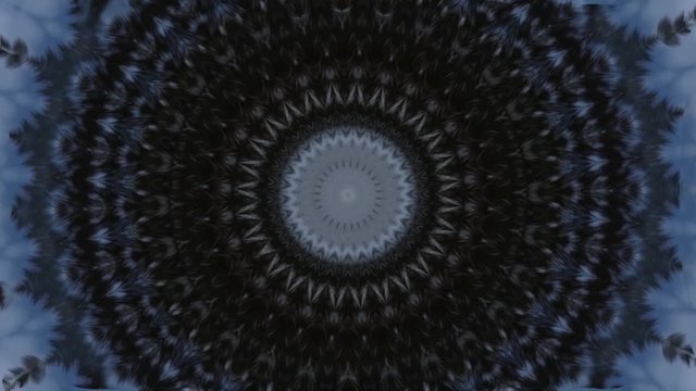 Background of blue and black openwork circles diverging from the center in a hypnotic rhythm.