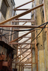 Fototapeta premium Wooden structures in the narrow streets of Fez, Morocco.