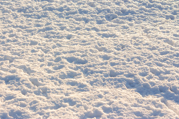 natural snow white texture. bright winter background. cold frosty weather condition. shining and glittering particles