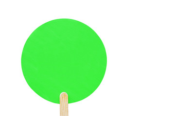 round green wooden plate on a wooden stick with copy space. isolated. banner for advertising