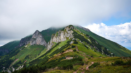 Fototapeta premium Mountain range mid cloudy day landscape shot, High Tatras Slovakia