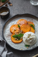 Buratta italian cheese snack served on handmade plate