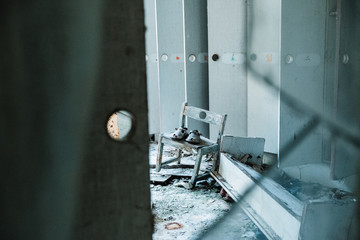 Child boots in the abandoned kindergarten in the ghost town of Pripyat, Ukraine