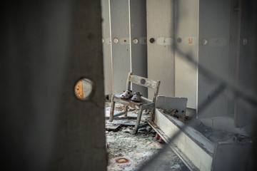 Child boots in the abandoned kindergarten in the ghost town of Pripyat, Ukraine,