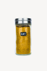 SPICE KARI IN GLASS BOTTLE ON WHITE BACKGROUND