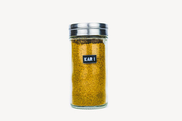 SPICE KARI IN GLASS BOTTLE ON WHITE BACKGROUND