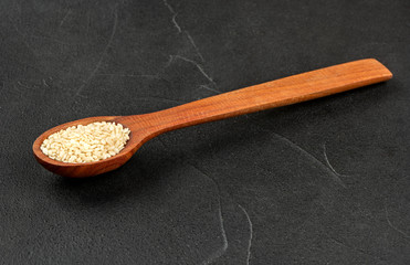 Sesame seeds in spoon