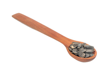 Sunflower seeds in a spoon