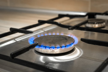 Gas flame stove on the home steel or iron burning, kitchen cook