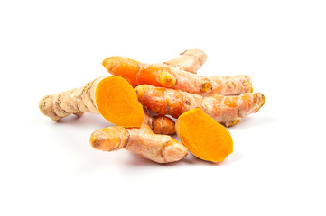 Pile of raw turmeric mixture (Curcuma longa Linn) and sliced ​​turmeric For making herbal medicine separately on a white background.