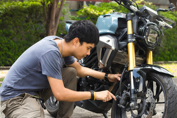 Mechanic fixing motocycle worn motorcycle drum breaks shoes. Professional training, repairing...