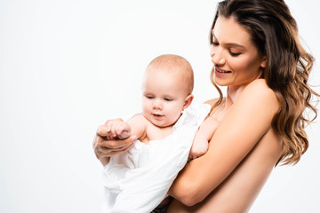 portrait of happy nude mother holding baby, isolated on white