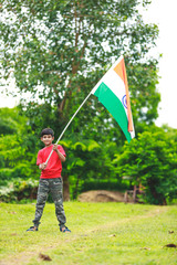 Cute little boy with Indian National Tricolor Flag	