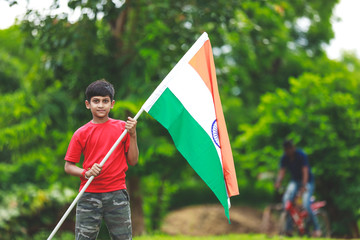 Cute little boy with Indian National Tricolor Flag	