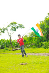 Cute little boy with Indian National Tricolor Flag	