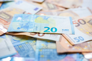 Background of 20 and 50 value Euro money bill close up
