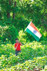 Cute little boy with Indian National Tricolor Flag	