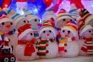 Fototapeta na wymiar Christmas toys snowmen background