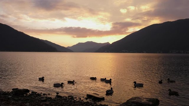 Lugano Lake. Bissone, tiny village on the lake. Cold winter sunset