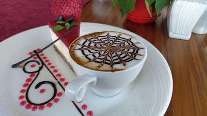 cup of cappuccino. white cup and cappuccino foam