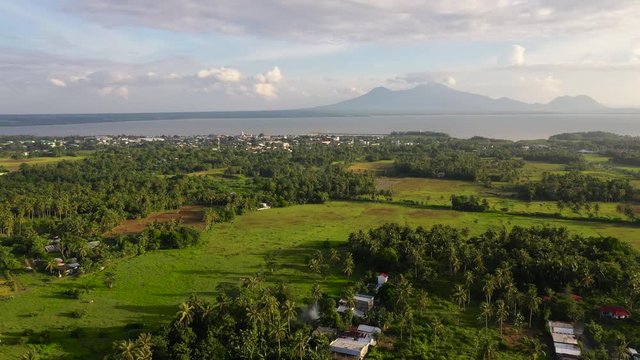 Sorsogon City, Luzon, Philippines. Asian town by the sea, top view. Tropical landscape with a town by the sea.
