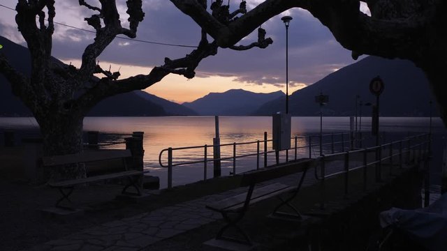 Lugano Lake. Bissone, tiny village on the lake. Cold winter sunset