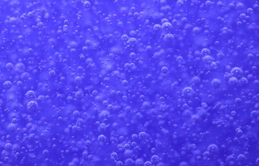 Bubbles in a blue bottle