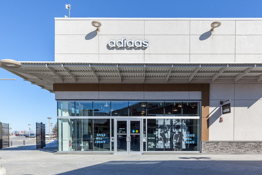 Niagara On the Lake, Canada- March 4, 2018: Adidas storefront in Outlet Collection at Niagara. Adidas is a multinational corporation in Germany designs and manufactures shoes, clothing and accessories