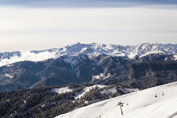 Fototapeta na wymiar Snow snowboard skiers ski resort mountain landscape