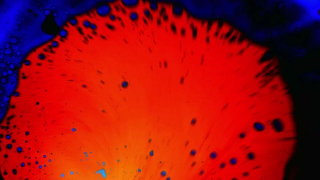 Psychedelic multicolored liquid light show, weird ink patterns in water, oil, paint. Authentic 60's disco oil wheel. Colorful background for visual performances, logos, music videos, titles, credits.