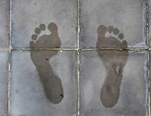 wet footprints on a terrace