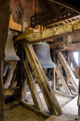 Fototapeta na wymiar Church bells in the steeple of the church of St. Wenceslas, Naumburg (Saale), Germany