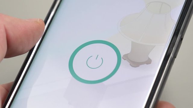 Using a smartphone app to turn a lamp ON and OFF using the wireless network.