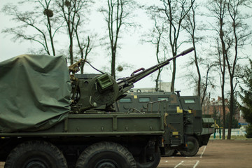 Fototapeta na wymiar Mobile air defense. Anti-aircraft installation on the car.