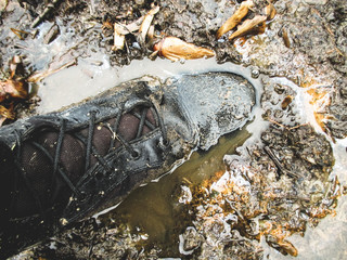 buried leg in mud, dirty