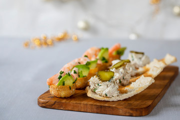 selection of festive canapes, devilled egg , mini prawn coctail, brussels sprout and toast