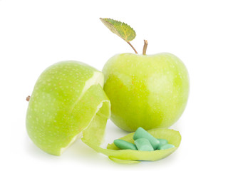 green apple and bubble gum isolated on white background