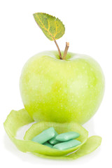 green apple and bubble gum isolated on white background