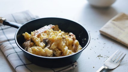 pasta with parmesan cheese and black olives