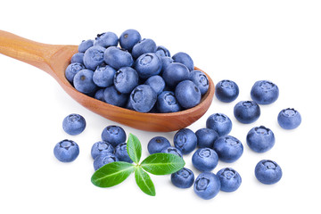 fresh ripe blueberry in wooden spoon isolated on white background