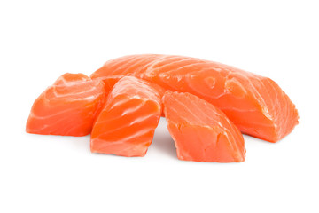 raw salmon piece cube isolated on white background close up