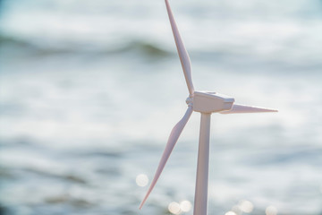 Wind turbine farm power generator in beautiful sea landscape for   production of renewable green...