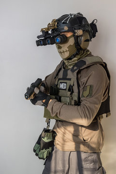 Navy SEAL United States soldier or private military contractor with Load out. Image on a grey background.
